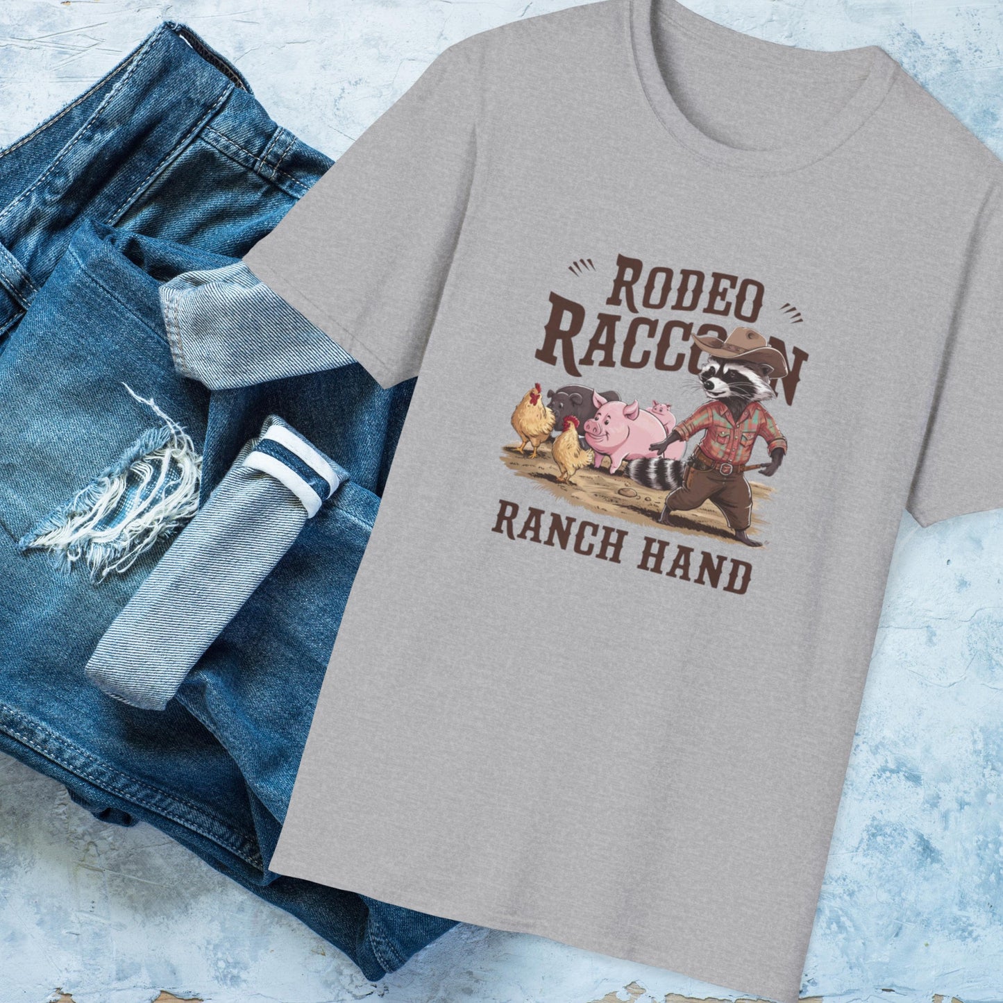 Rodeo Racoon Ranch Hand Unisex T-Shirt, Funny Cowboy Tee, Cute Wild West Shirt, Animal Lover Gift, Western Rodeo Apparel